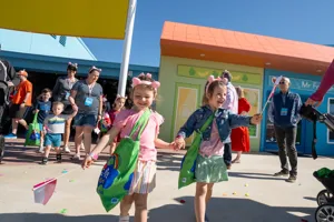 Children Holding Hands Entering Park