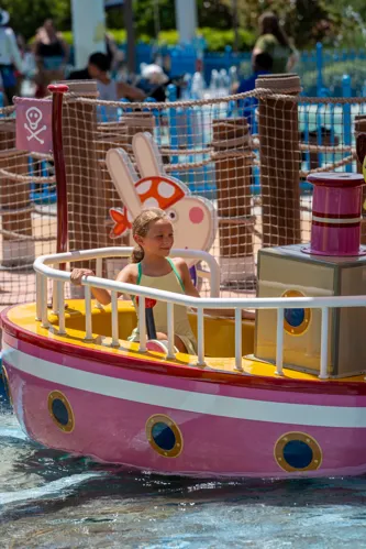Kid on pirate boat ride